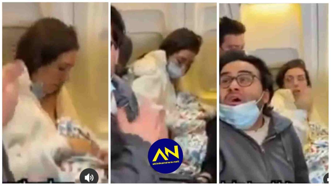 woman caught breastfeeding a cat on a flight